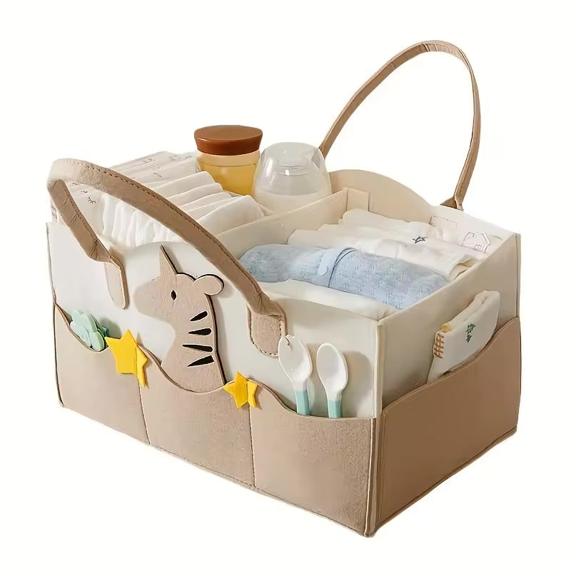 Baby organizer with baby items including a diaper, bottle, and toys on a white background